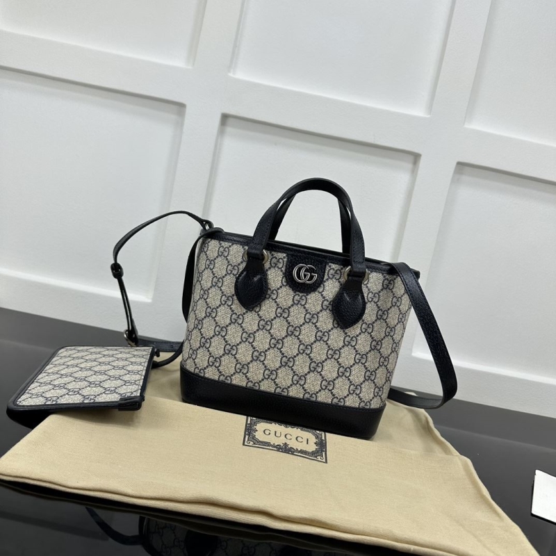 G*u*i shopping bags